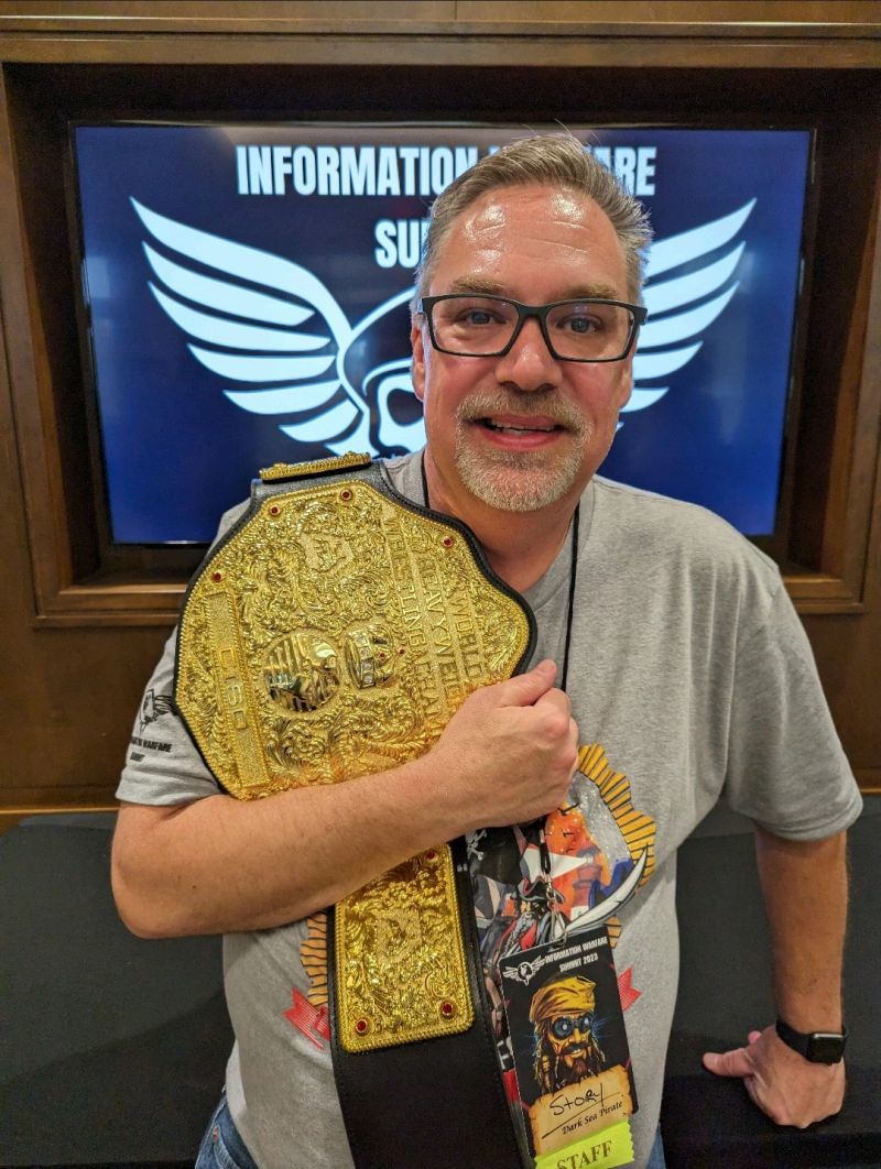 Jeff Story holding the belt
